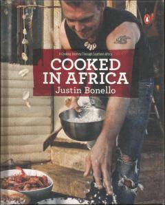 Front cover of Cooked in Africa by Justin Bonello